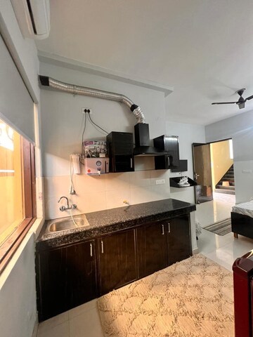 Kitchen in 1 RK Builder Floor at Paryavaran Complex – for Rent