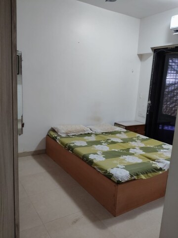 Bedroom in 2 BHK Apartment at Maharaja Retreat CHS, Goregaon East – for Rent