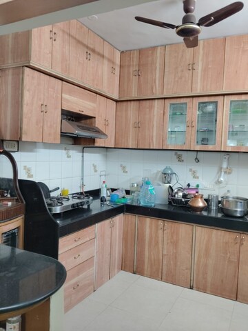 Kitchen in 2 BHK Apartment at Maharaja Retreat CHS, Goregaon East – for Rent