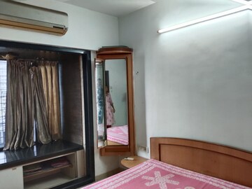 Bedroom in 2 BHK Apartment at Maharaja Retreat CHS, Goregaon East – for Rent