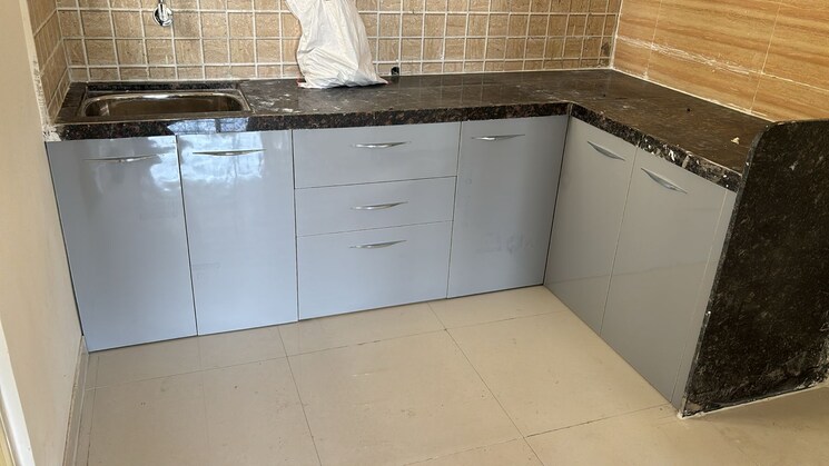 Kitchen, om-tropica 2 Bedroom 602 Sq.Ft. Apartment In Ravet Pune 9106349