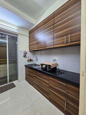 Kitchen in 1 BHK Apartment at Thakur Gayatri Satsang, Kandivali East – for Sale