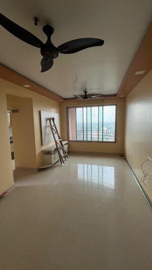 Living Room in 2 BHK Apartment at Ajmera Yogidham New Era, Kalyan West – for Sale