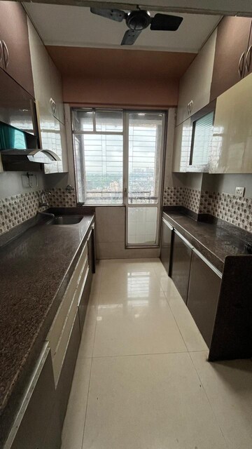 Kitchen in 2 BHK Apartment at Ajmera Yogidham New Era, Kalyan West – for Sale