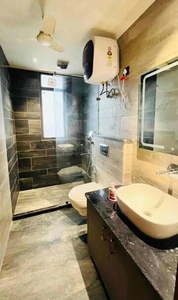 Bathroom in 3.5 BHK Builder Floor at Sainik Farm – for Rent