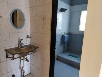 Bathroom in 2 BHK Apartment at Pimple Saudagar – for Rent
