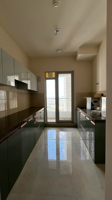 Kitchen in 2 BHK Apartment at Piramal Vaikunth, Balkum Pada – for Rent