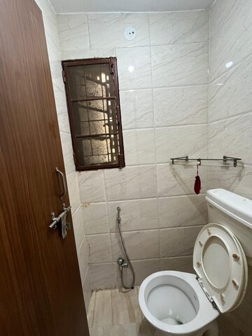 Bathroom in 2.5 BHK Apartment at Janakpuri – for Sale