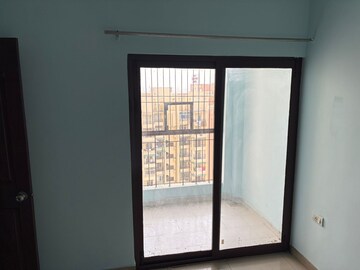 Room in 2 BHK Apartment at Charms Castle, Raj Nagar Extension – for Rent