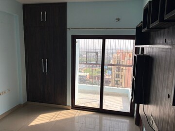 Room in 2 BHK Apartment at Charms Castle, Raj Nagar Extension – for Rent