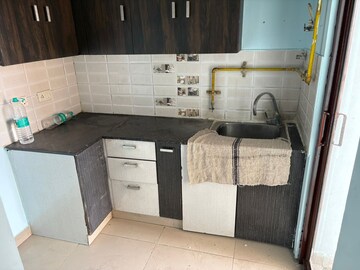 Kitchen in 2 BHK Apartment at Charms Castle, Raj Nagar Extension – for Rent