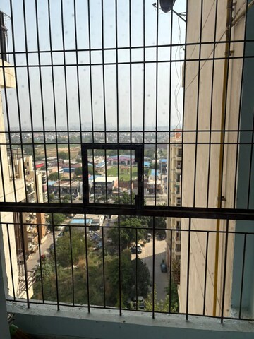 Balcony in 2 BHK Apartment at Charms Castle, Raj Nagar Extension – for Rent