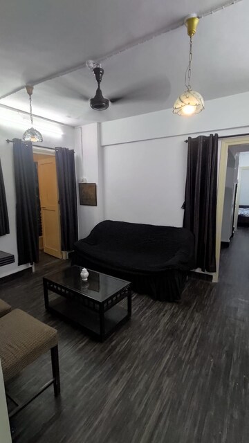 Living Room in 1 BHK Apartment at Evershine CHS Malad, Malad West – for Rent