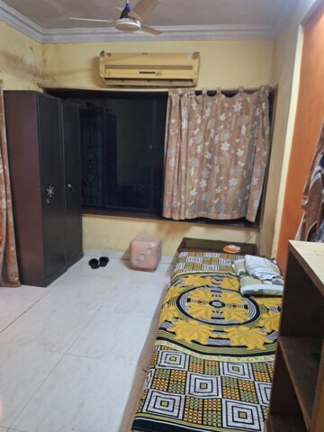 Bedroom in 2 BHK Apartment at Gurukripa CHS, Andheri East – for Rent