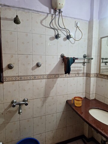 Bathroom in 2 BHK Apartment at Gurukripa CHS, Andheri East – for Rent