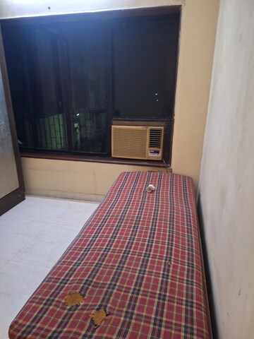 Bedroom in 2 BHK Apartment at Gurukripa CHS, Andheri East – for Rent