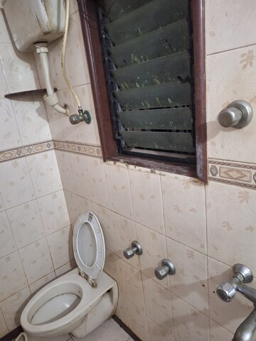 Bathroom in 2 BHK Apartment at Gurukripa CHS, Andheri East – for Rent