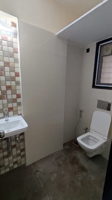 Bathroom in 1 BHK Apartment at Evershine CHS Malad, Malad West – for Rent