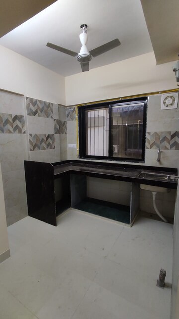 Kitchen in 1 BHK Apartment at Evershine CHS Malad, Malad West – for Rent