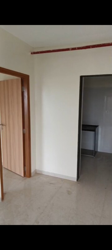 Room in 2 BHK Apartment at Pratham ARC Aura, Andheri West – for Rent