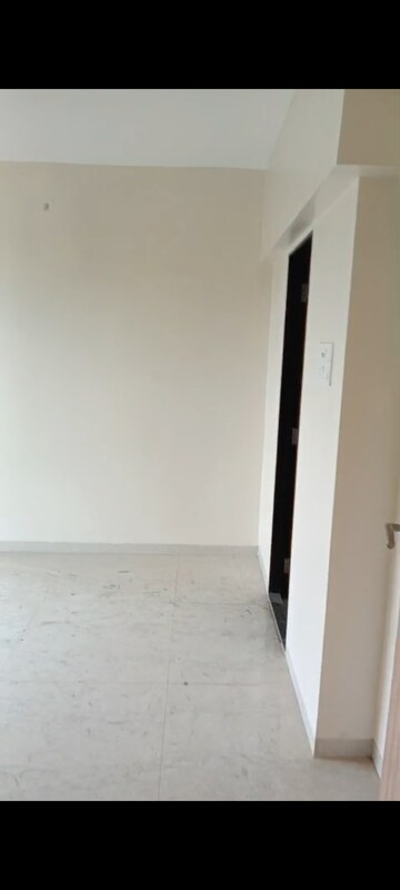 Room in 2 BHK Apartment at Pratham ARC Aura, Andheri West – for Rent