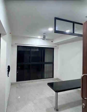 Living Room in 1 BHK Apartment at Lodha Crown Quality Homes, Majiwada – for Rent