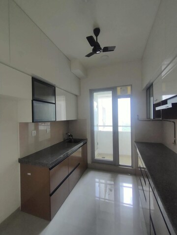 Kitchen in 2 BHK Apartment at Piramal Vaikunth, Balkum Pada – for Rent
