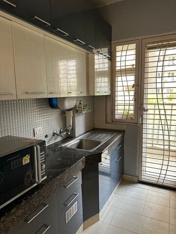 Kitchen in 3 BHK Apartment at SS The Coralwood, Sector 84 – for Rent