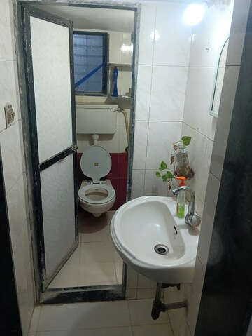 Bathroom in 1 BHK Apartment at Mahesh Nagar CHS, Goregaon West – for Rent