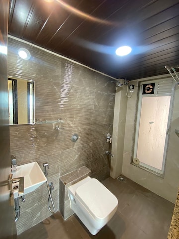 Bathroom in 2 BHK Apartment at Gurukrupa Marina Enclave, Malad West – for Rent