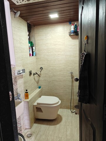 Bathroom in 1 BHK Apartment at Raunak Unnathi Greens, Kasarvadavali – for Sale