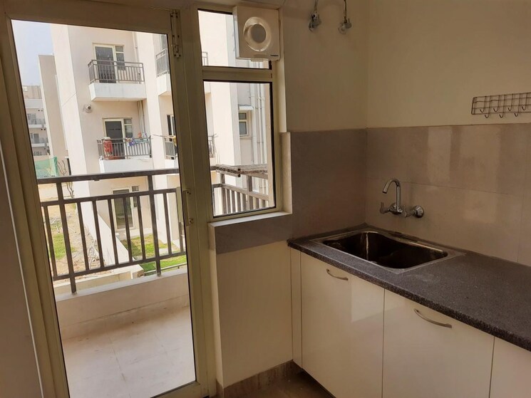 Kitchen, puri-aman-vilas 3 Bedroom 2230 Sq.Ft. Builder Floor In Sector 89 Faridabad 9107379