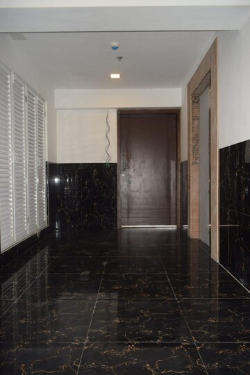 Building Lobby in 2 BHK Apartment at Ruparel Ariana, Parel – for Rent