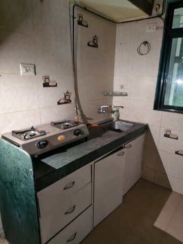 Kitchen in 1.5 BHK Apartment at Vihang Valley Rio, Kasarvadavali – for Rent