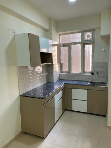 Kitchen in 3 BHK Apartment at Auric City Homes, Sector 82 – for Rent