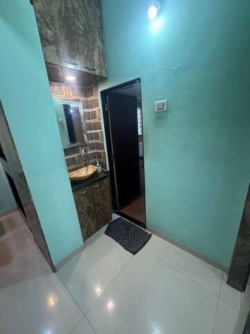 Living Room in 2 BHK Apartment at Laxmi Kailash Garden , Kalyan West – for Sale