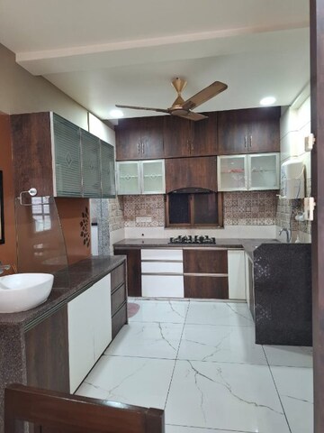 Kitchen in 3 BHK Apartment at Synnove Palladium, Vasna Bhayli Road – for Rent