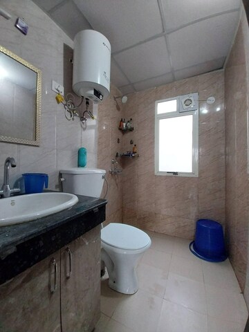 Bathroom in 2 BHK Apartment at Nimbus Express Park View, Chi V Greater Noida – for Sale