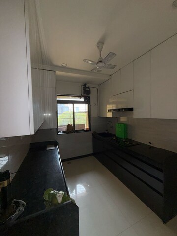 Kitchen in 3 BHK Apartment at Acme Ozone, Manpada – for Rent