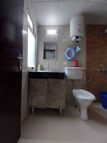 Bathroom in 2.5 BHK Apartment at Nimbus The Park Street, Chi V Greater Noida – for Sale