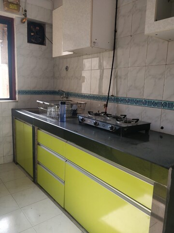 Kitchen in 2 BHK Apartment at Hiranandani Garden Brentwood, Powai – for Rent