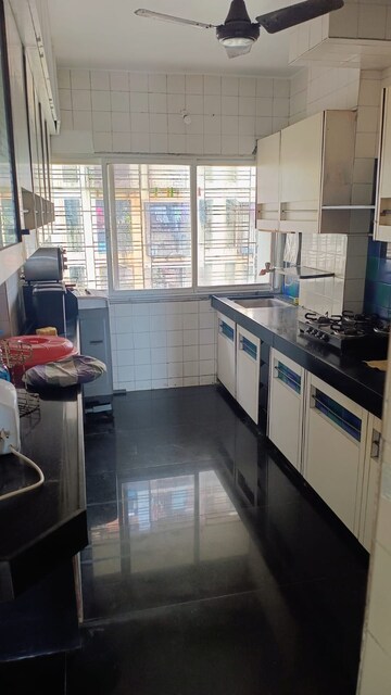 Kitchen in 2 BHK Apartment at Saibaba Tower, Andheri West – for Rent