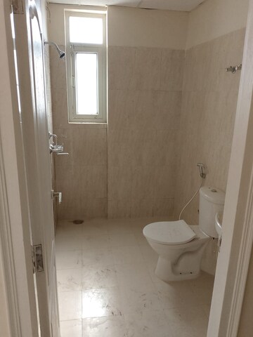 Bathroom in 3 BHK Apartment at Sushant Golf City – for Rent