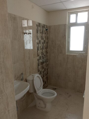Bathroom in 3 BHK Apartment at Sushant Golf City – for Rent