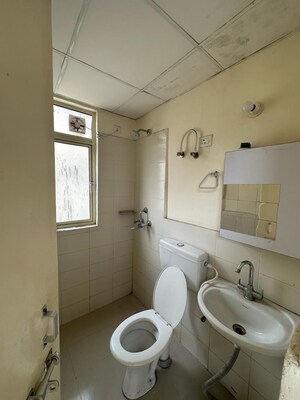Bathroom in 2 BHK Apartment at Adore Happy Homes, Sector 86 – for Sale