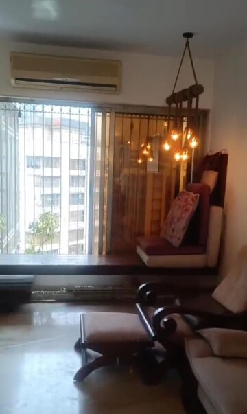 Living Room in 3 BHK Apartment at Link Garden, Andheri West – for Rent