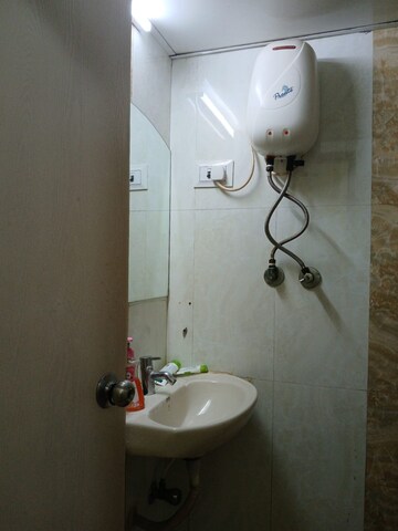 Master Bedroom in 2 BHK Apartment at Haware Indraprastha Regency, Goregaon West – for Rent