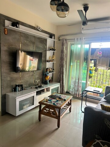 Living Room in 1 BHK Apartment at Lodha Amara, Kolshet Road – for Rent