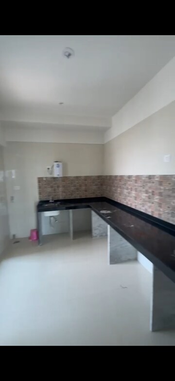 Kitchen in 4 BHK Apartment at Raj Infinia, Malad West – for Sale