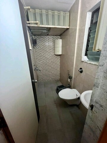 Bathroom in 2 BHK Apartment at Raj Spaces Apartment, Goregaon West – for Rent